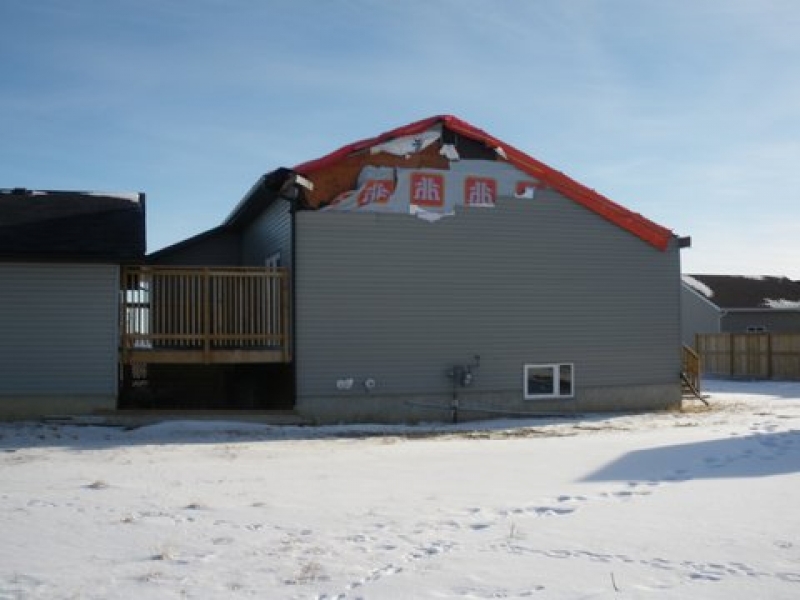 House with roof damage